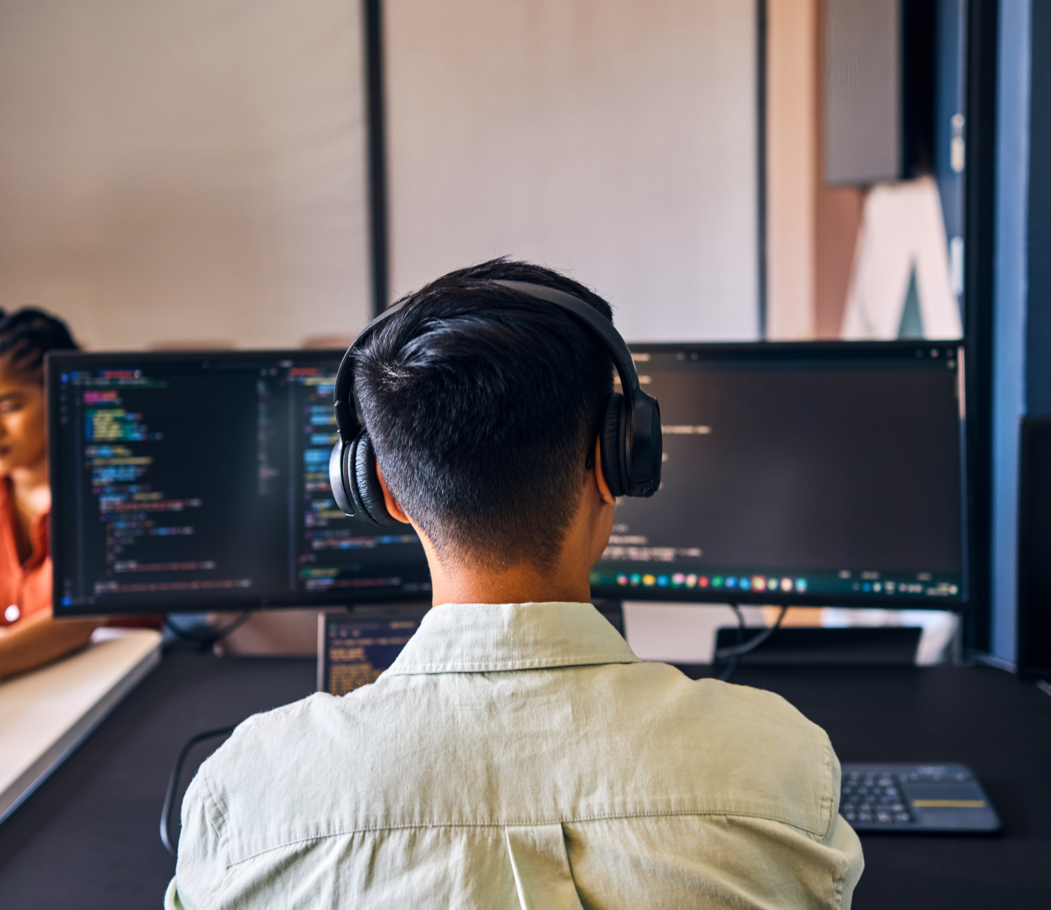 A Shopify migration expert collaborates on screen coding a brand new website.